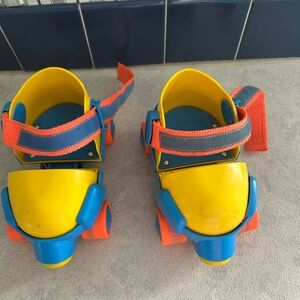 Fisher Price roller skates vtg kids adjustable skates 1992 yellow blue toddler